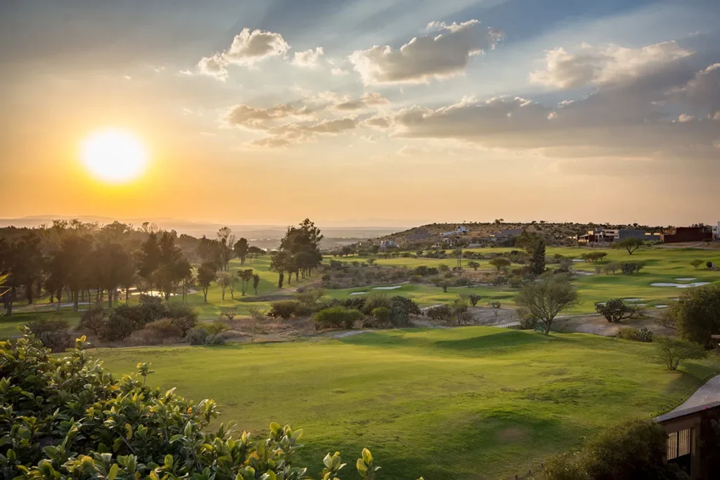 Sunset over golf course at Club de Golf Malanquin San Miguel de Allende with mountain views