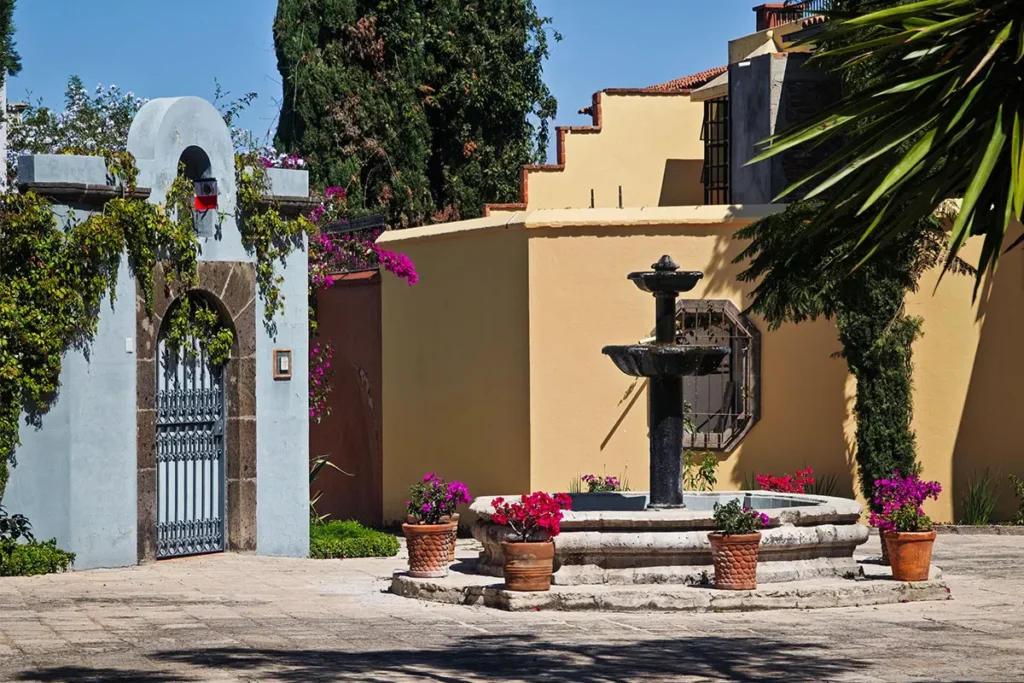 Fountain and courtyard entrance at hillside home in Balcones San Miguel de Allende