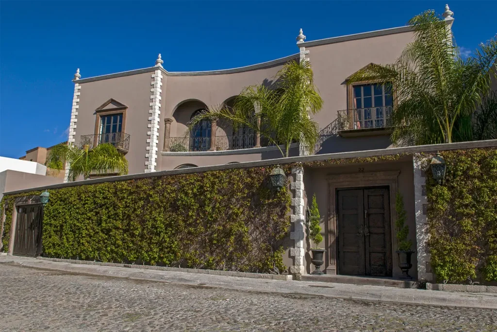 Luxury villa with balconies on residential street in Balcones San Miguel de Allende