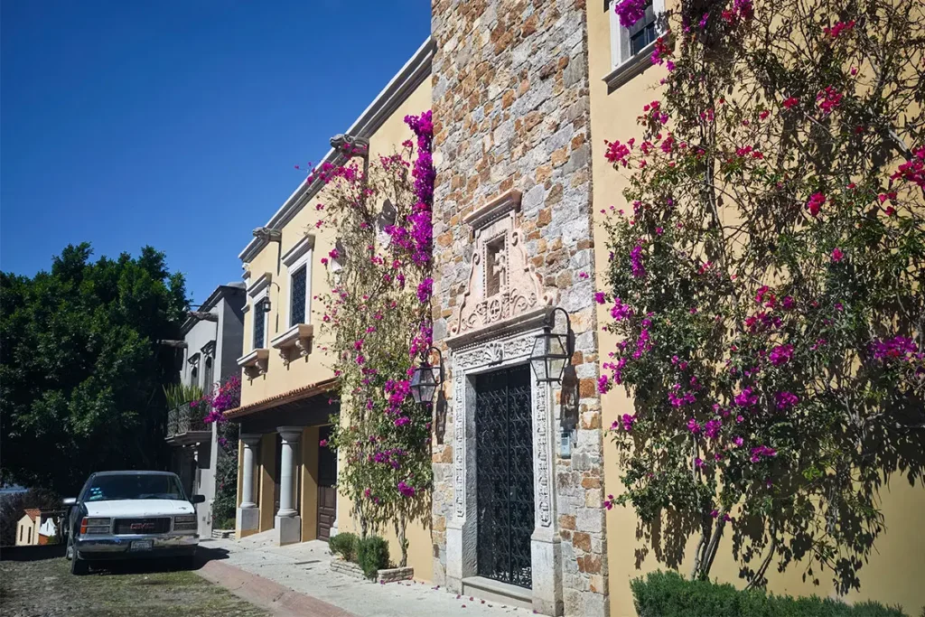 Stone and stucco home with bougainvillea in Balcones neighborhood San Miguel de Allende