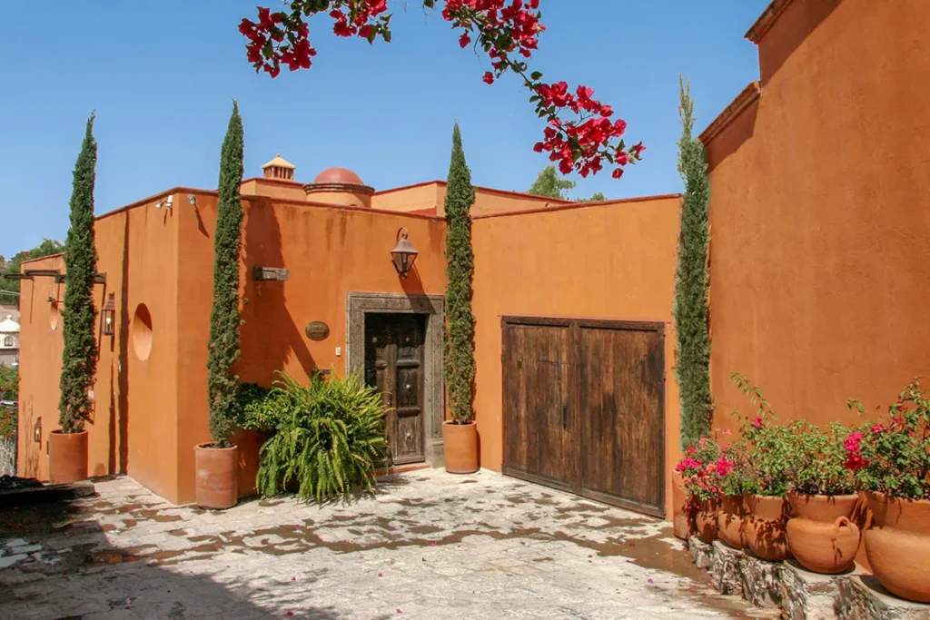 Terracotta colored home with courtyard in Balcones San Miguel de Allende