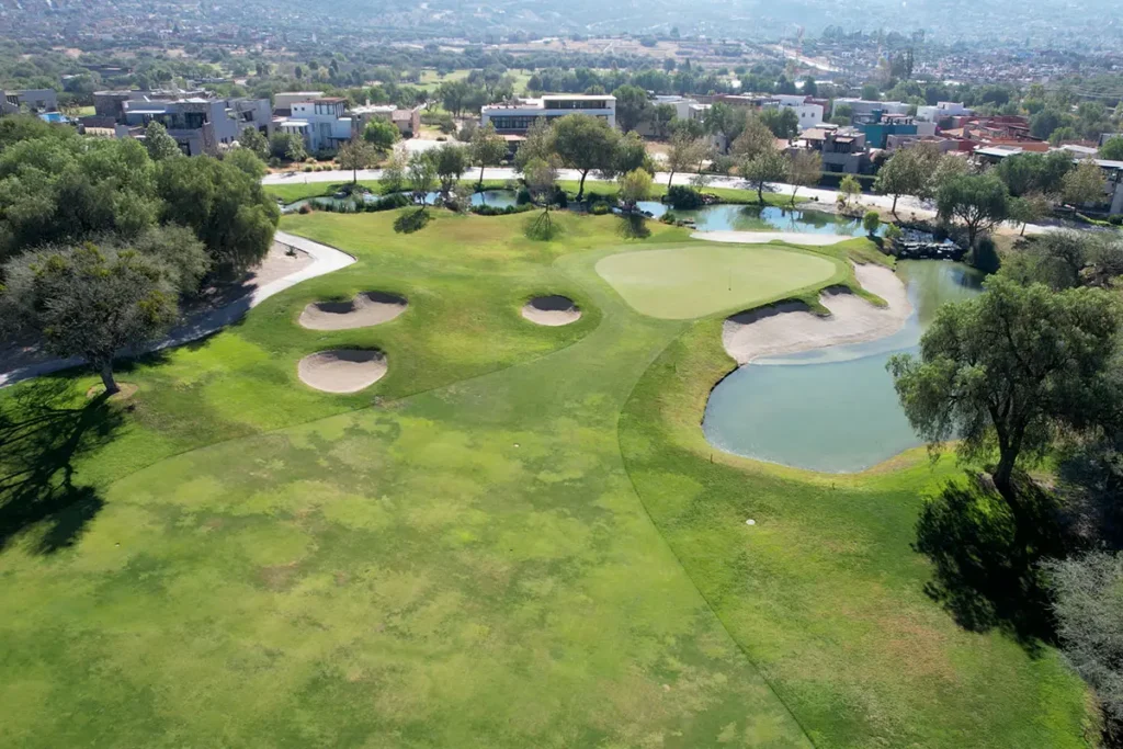 Aerial view of golf course with water features at Las Ventanas San Miguel de Allende
